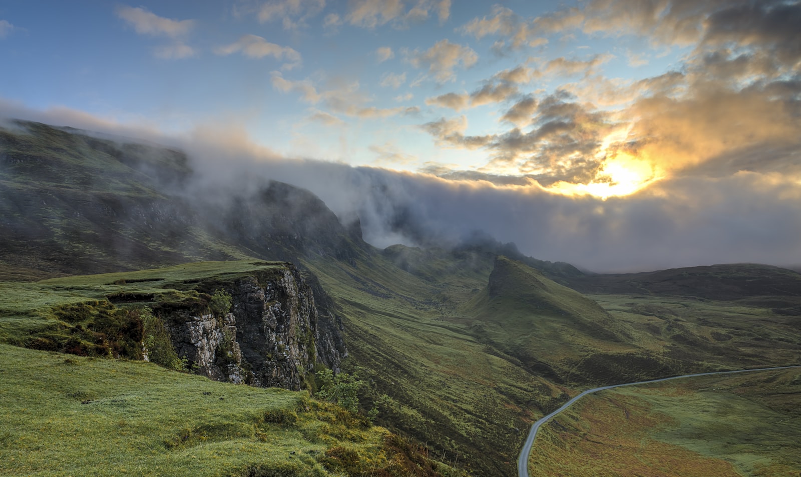 Mountain landscape illuminated at sunrise